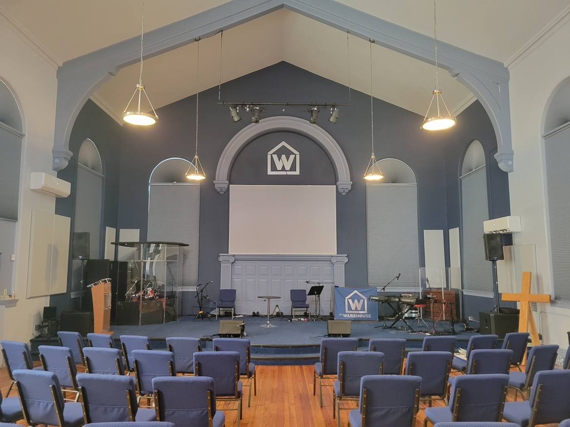 White cellular shades in a church