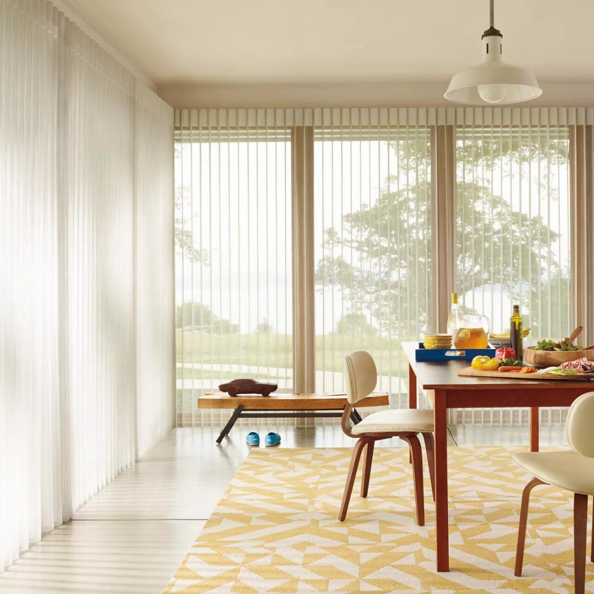 Floor length windows with vertical blinds